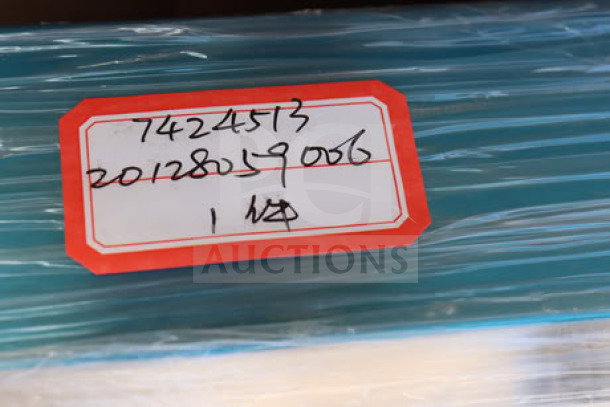 Brand new Cooking Performance Group backsplash assembly, model 351059006, with damaged packaging. Label shows part number.