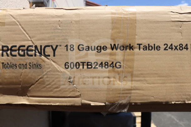Regency 600TB2484G stainless steel work table, new in box, features 24"x84" size, 18 gauge, 4" backsplash, galvanized legs.