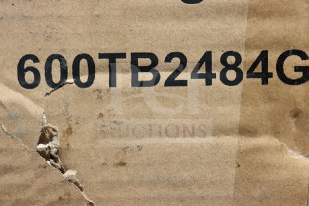 BRAND NEW Regency 600TB2484G stainless steel commercial work table in original packaging, showing label with model number.
