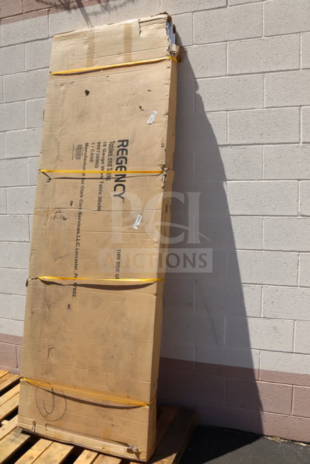 BRAND NEW Regency 600T3096G 30" x 96" stainless steel work table in original packaging, with galvanized legs and undershelf.