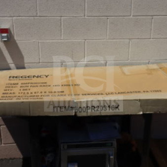 Regency 600PR20316K 20 Pan End Load Bun/Sheet Pan Rack in original, damaged packaging.