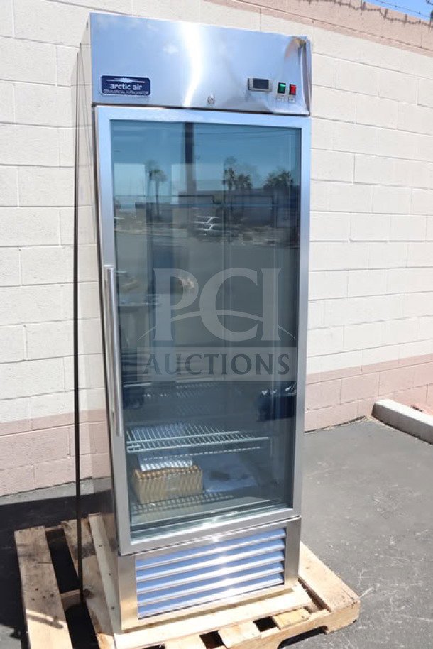 Brand new Arctic Air AGR23 glass door refrigerator, 27", 23 cu. ft., 115V. Top left corner dent, no hard crease.
