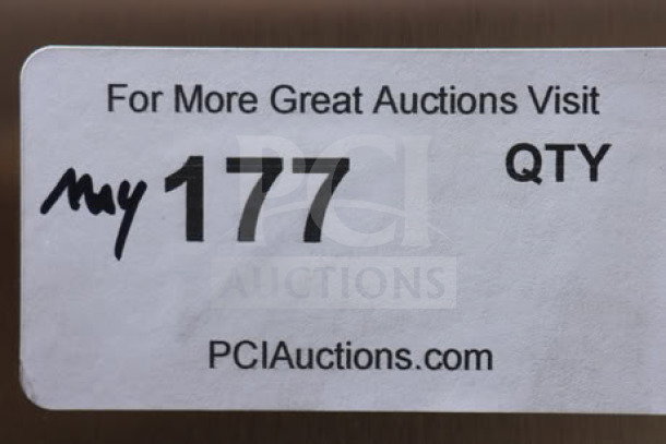 Sticker from PCIAuctions.com displaying auction lot number "177."