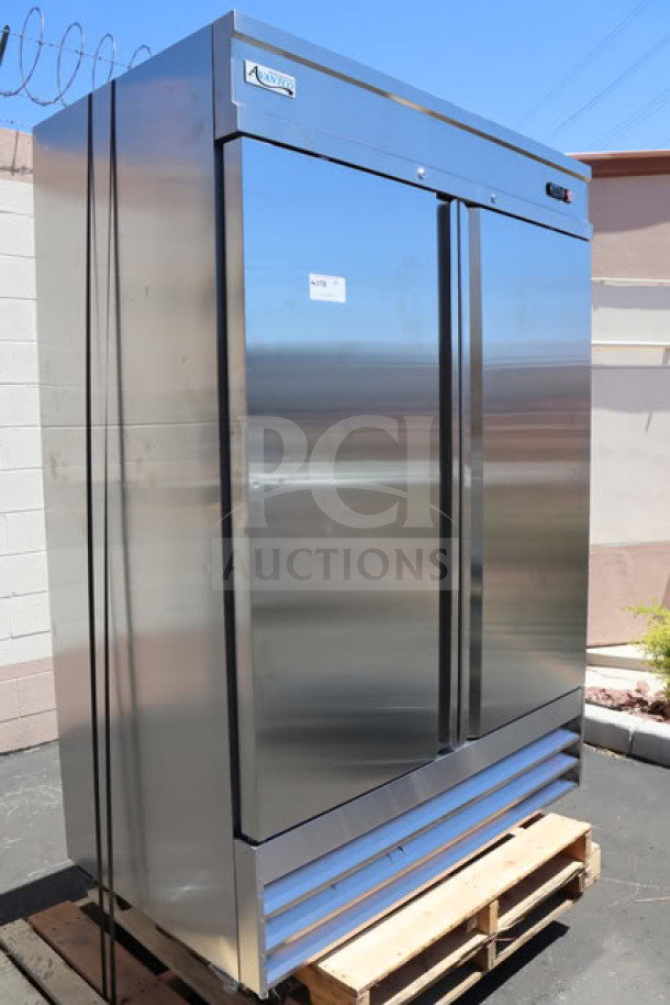 Avantco SS-2F-HC 54" stainless steel freezer, new, with self-closing doors, epoxy shelves, and commercial casters.