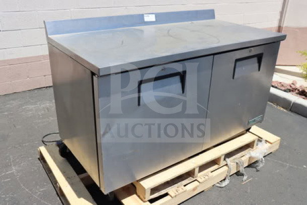 True TWT-60F-HC 60" worktop freezer, dual doors, stainless steel, 3 9/16" backsplash, on pallet, good condition.