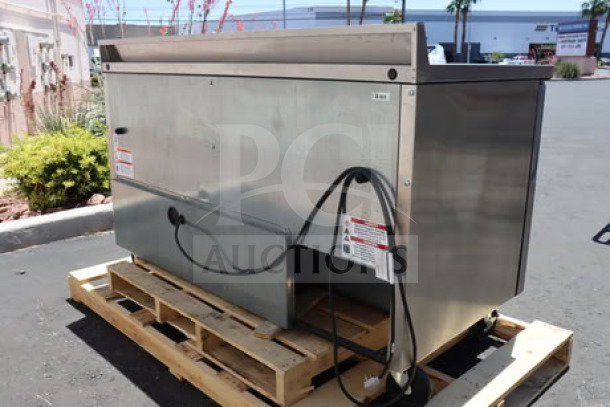 True TWT-60F-HC worktop freezer on a pallet, stainless steel, with 3 9/16" backsplash, serial #11108084, in used condition.