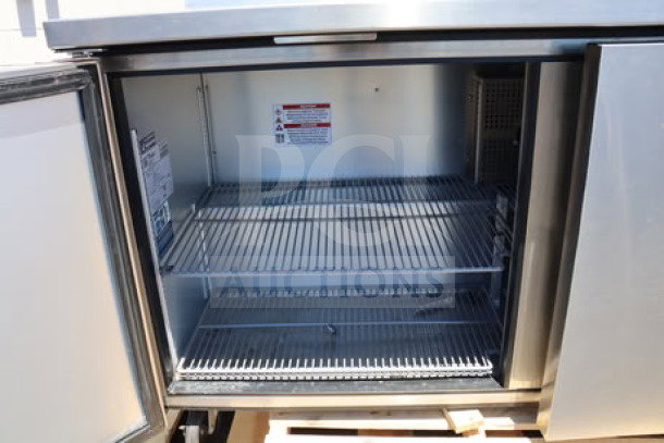 True TWT-60F-HC worktop freezer, serial #11108084, features stainless steel finish, 60 3/8" size, includes 3 9/16" backsplash, dual shelves, 115V.