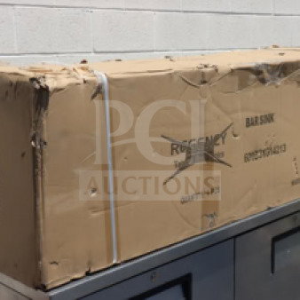 Brand new Regency 60" x 18 3/4" three-bowl underbar sink with two drainboards, model 600B31014213, in damaged packaging.