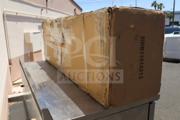 Brand new Regency 60" x 18 3/4" three bowl underbar sink with drainboards, model 600B31014213. Packaging damaged.