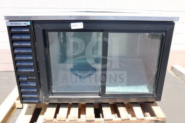 BRAND NEW Beverage-Air BB58HC-1-GS-B back bar refrigerator, black, 59", sliding glass doors, 115V, dent on top right.