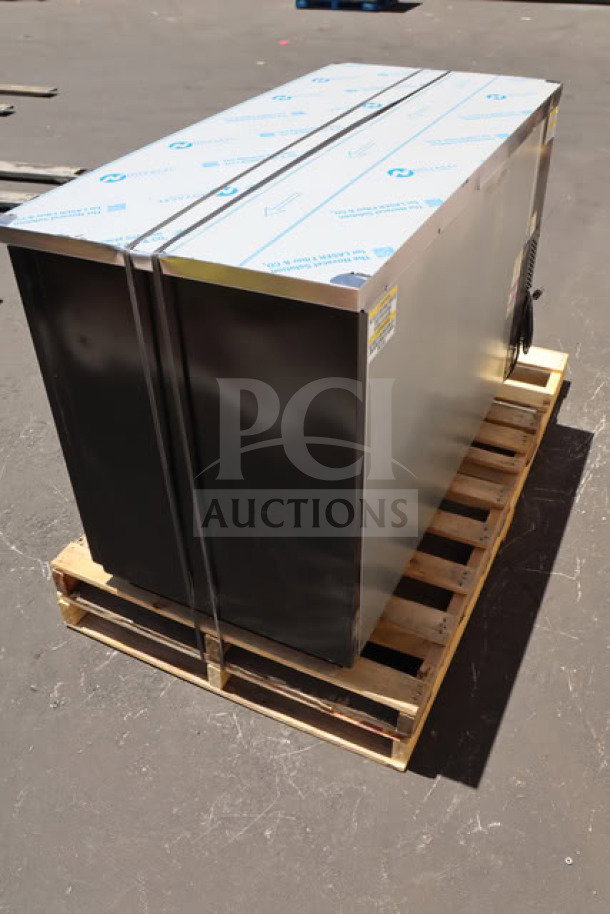 Beverage-Air BB58HC-1-GS-B back bar refrigerator, 59", black, sliding glass doors, new with top right dent, on a pallet.