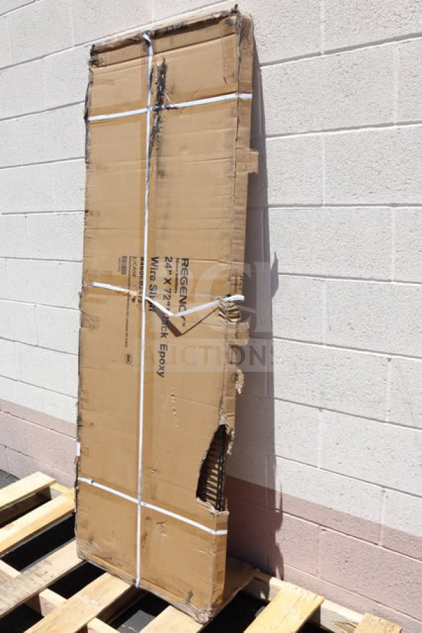 Brand new Regency 460EB2472 24"x72" NSF black epoxy wire shelf in original box, slight box wear visible.