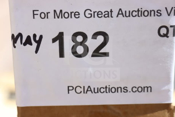 BRAND NEW in box Regency 460EB2472 24" x 72" NSF black epoxy wire shelf, tags indicating auction details visible.