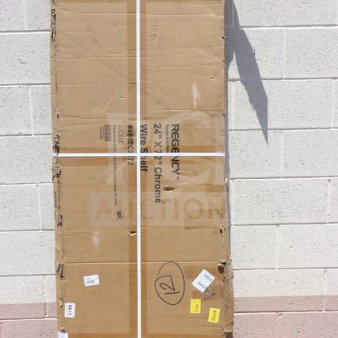 Brand new Regency 460EC2472 24"x72" NSF Chrome Wire Shelf, factory packaged. Model markings visible on the packaging.