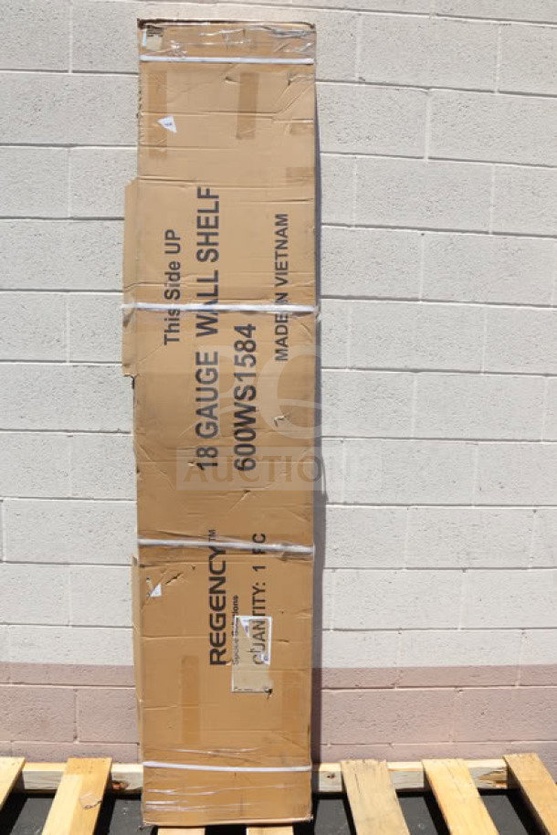 Regency 600WS1584 wall shelf in original damaged packaging; 18-gauge stainless steel, 15" x 84", made in Vietnam.