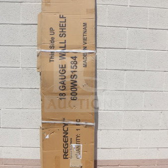 Regency 600WS1584 wall shelf in original damaged packaging; 18-gauge stainless steel, 15" x 84", made in Vietnam.
