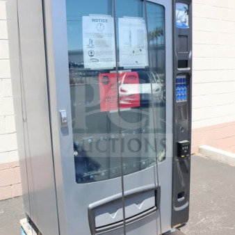 BRAND NEW Seaga ENV5B vending machine with minor scratches. Refrigerated, 115V, 4A, 1 Phase. Holds 40 items.
