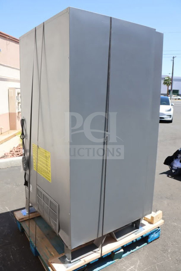 Brand new Seaga ENV5B refrigerated vending machine, 40-item capacity, minor scratches and dings, 115 volts, 4 amps, 1 phase.
