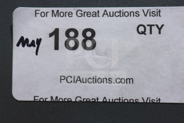 Label marked "May 188 QTY" with PCI Auctions website; associated with Seaga ENV5B vending machine.