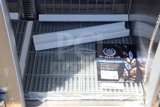 Beverage-Air HFPS3HC-1S Horizon Series 78" 3 Door Freezer interior with wire shelves and user guide. Includes 9 shelves.