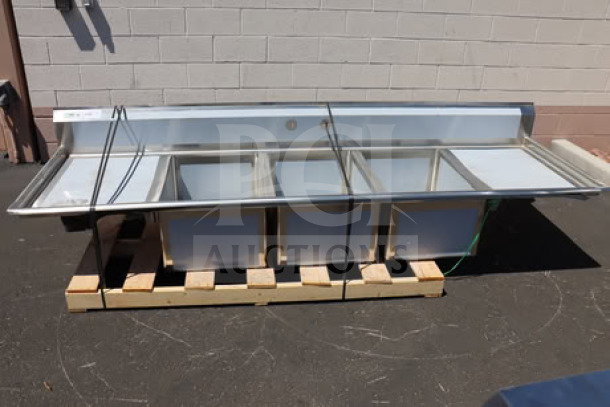 Regency Spec Line 112" three-compartment commercial sink with two 24" drainboards, model 600S32028224, new, minor scratches.
