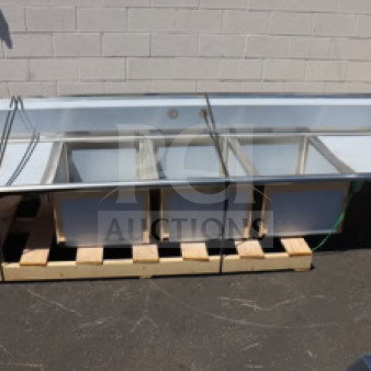 Regency Spec Line 112" three-compartment commercial sink with two 24" drainboards, model 600S32028224, new, minor scratches.