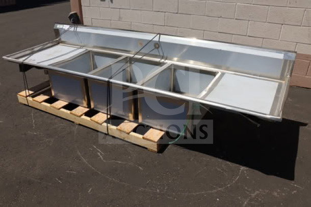 Regency Spec Line 600S32028224, 112" brand new three-compartment commercial sink with two 24" drainboards, minor scratches/dents.