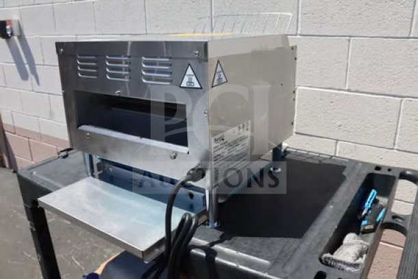 Brand new Avantco T3600B commercial conveyor toaster, 14.5" wide, 3" opening, 3600W, 1200 slices/hr; minor dents visible.