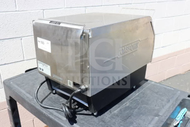 Hatco TQ-800H Toast Qwik conveyor toaster, 3" opening, 208V. Used condition, serial number 5684392506 visible.