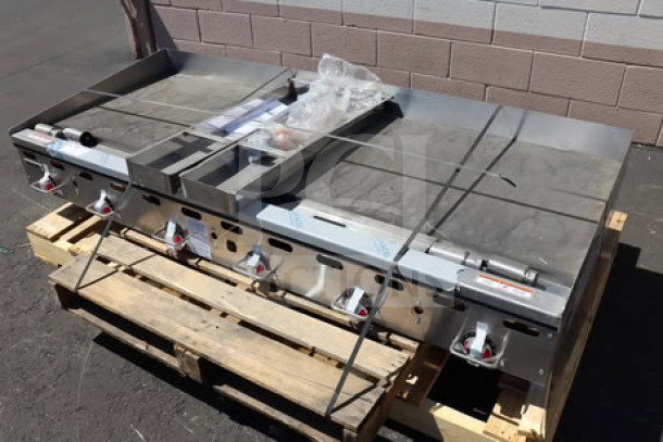 Brand new Vulcan MSA-72-102 72" liquid propane griddle on pallet, scratch-n-dent condition, 162,000 BTU, thermostatic controls.