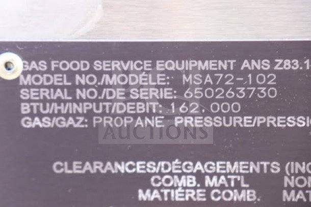 "Vulcan MSA72-102 griddle label showing model MSA72-102, serial 650263730, 162,000 BTU, propane fuel, and safety standards."