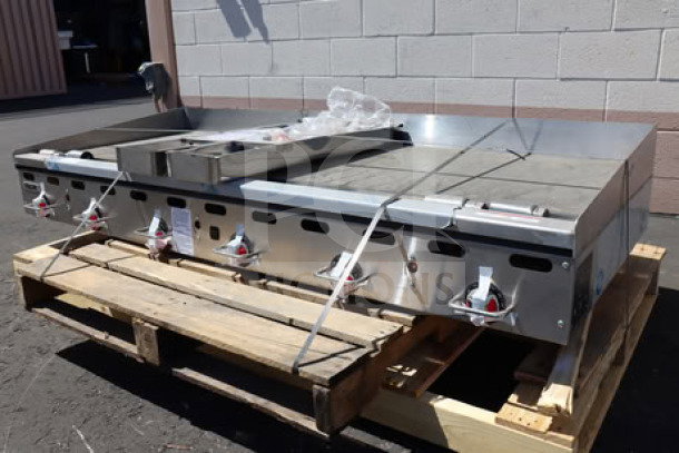 Brand new Vulcan MSA-72-102 72" countertop propane griddle. Features snap-action thermostatic controls, 162,000 BTU.