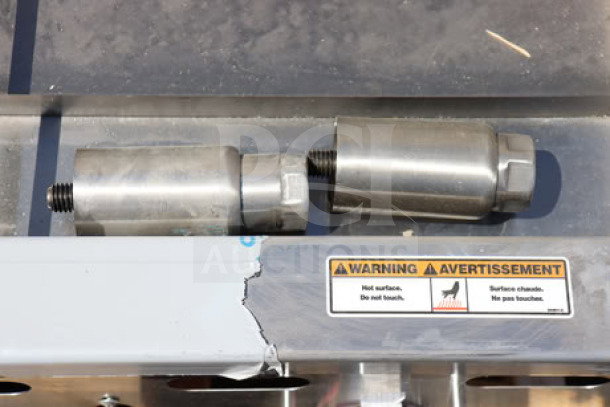 Brand new Vulcan MSA-72-102 propane griddle showing a scratch and dent, with thermostatic controls, and warning label displayed.