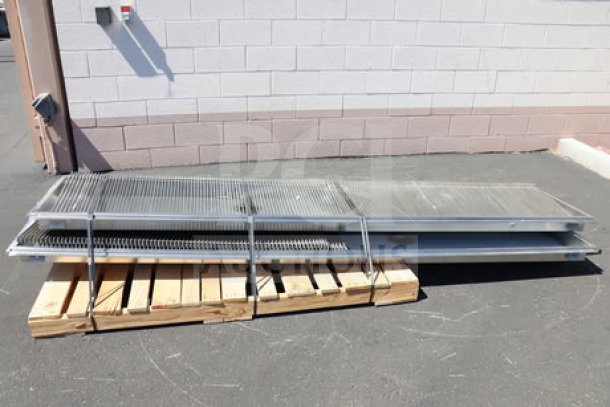Regency model 600FT1260SS stainless steel floor troughs with grates, 12" x 60", new scratch-and-dent, on wooden pallet.