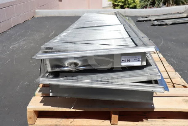 Regency 600FT1260SS stainless steel floor trough with grate, brand new with slight dents, size 12" x 60", on a pallet.
