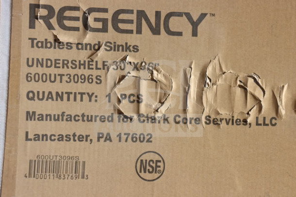 Regency 600UT3096S stainless steel work table undershelf packaging, showing label details, and damaged box condition.
