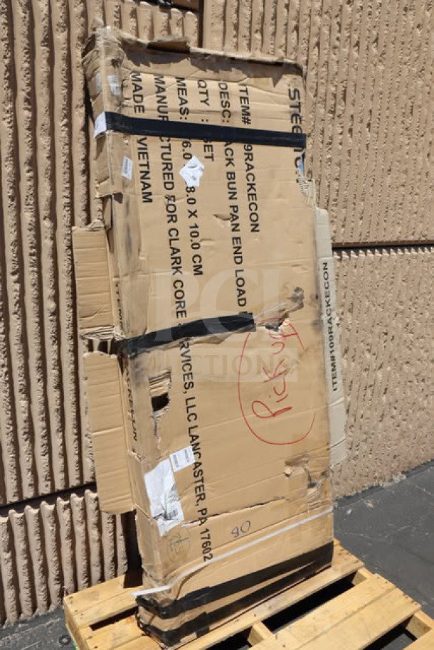 Brand new Steelton 109RACKECON 20 Pan End Load Bun/Sheet Pan Rack, unassembled. Damaged box, labels visible.