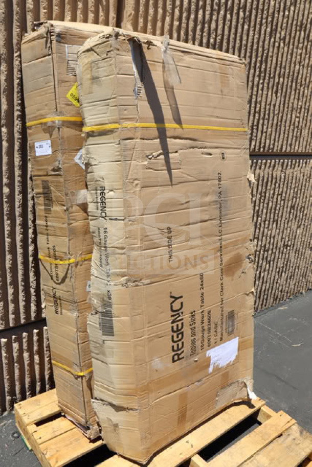 BRAND NEW Regency 600TSB2460S 24"x60" stainless steel work table in damaged packaging on pallet.