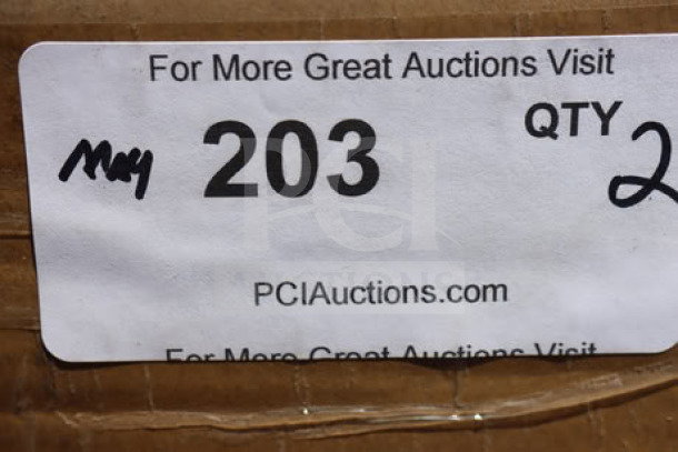 Regency 600TSB2460S stainless steel work table, brand new, 24"x60", 4" backsplash, undershelf. Damaged packaging visible.