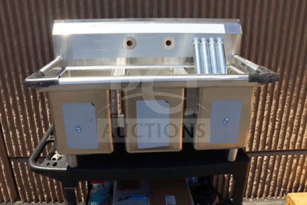 Brand new Regency 39" three-compartment commercial sink, model 600S31014, with galvanized steel legs; top right corner bent.