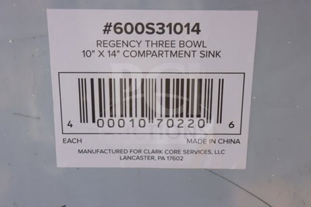 Brand new Regency 600S31014 three-compartment commercial sink with galvanized steel legs. Top right corner bent. Out of packaging.