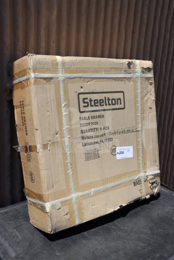 Brand new Steelton 522DR2020 drawer in box, 22"x20"x5.625", stainless steel front, unopened, visible packaging details.