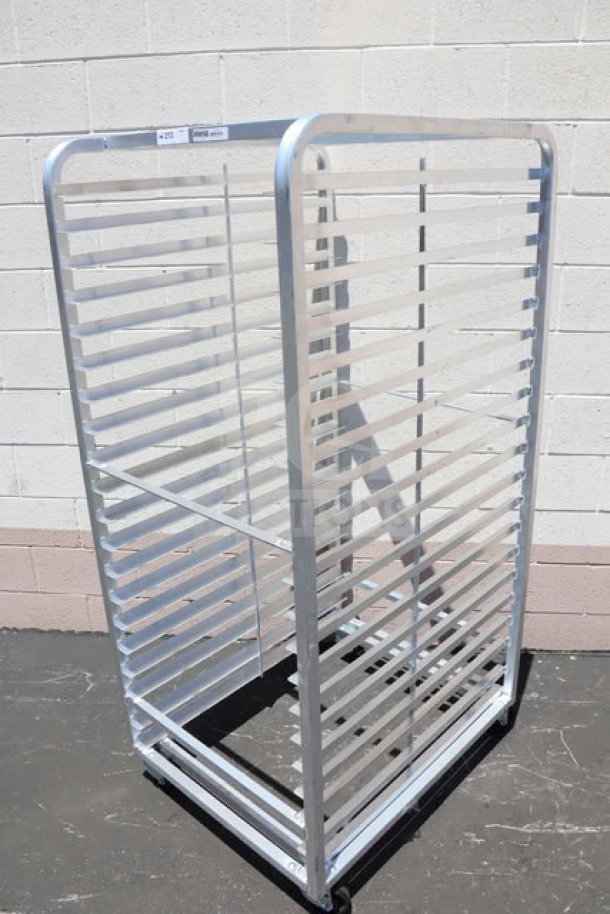 Brand new Channel 411A-DOR aluminum bun pan oven rack, 40-pan capacity, double section, side load, may have minor scratches.