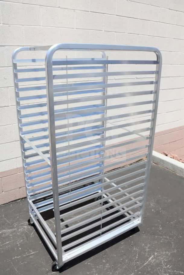 Channel 411A-DOR aluminum bun pan rack, double section, side load, holds 40 pans, new with minor scratches and dings.