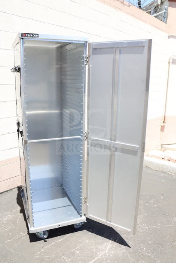BRAND NEW Cres Cor 109-1840 aluminum enclosed insulated pan rack; holds 40 pans; minor scratches; on casters; assembled.