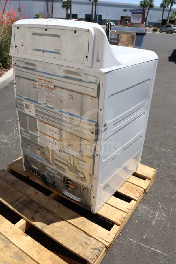 BRAND NEW GE GTX52EASPWB 6.2 cu. ft. Front Load Dryer on a pallet. Minor scratching, no original packaging. Commercial use.