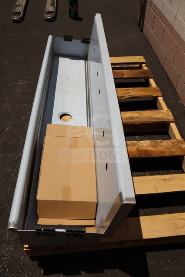Regency 600HSMS1872 wall-mounted 72" x 17.5" hand sink, new, out of box, for three 8" center faucets, on pallet.