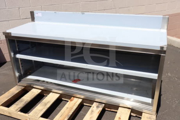 Brand new Advance Tabco CK-SS-306M 30"x72" work table with cabinet base, mid shelf, 5" backsplash, slight scratches.