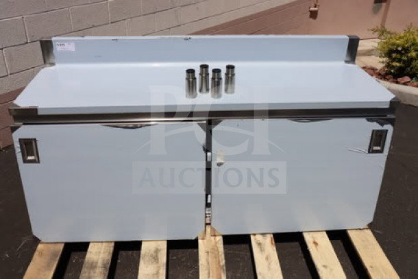 Brand new Advance Tabco CK-SS-306M work table, 30"x72", 14 gauge, cabinet base, mid shelf, 5" backsplash, minor scratches.
