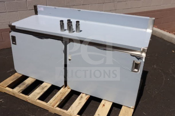 BRAND NEW Advance Tabco CK-SS-306M 30"x72" work table, 14 gauge, cabinet base, mid shelf, 5" backsplash, minor dents visible.